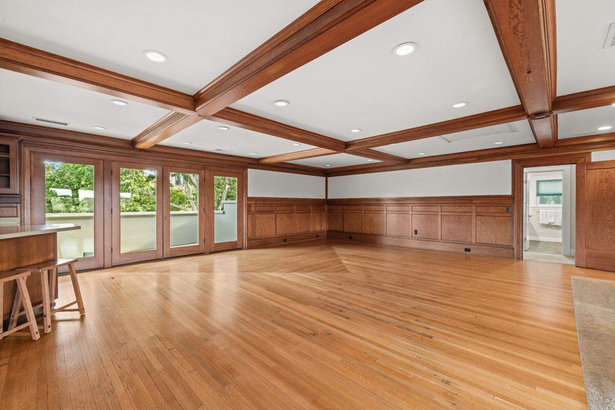The West Southwood Drive residence has a spectacular ballroom and wet bar upstairs with access to a deck outside.