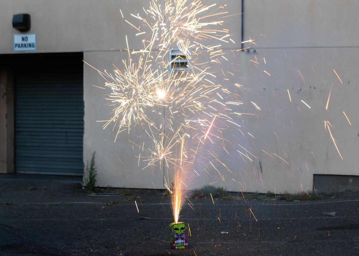 TNT Fireworks’ “Martian Man” shoots a series of explosions into the air on Monday.