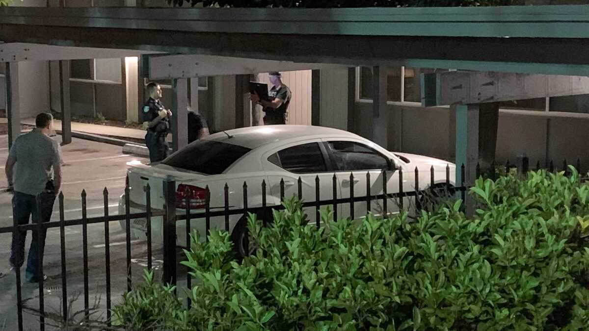 Police investigate a vehicle believed to be used by a suspect in the fatal shooting of a man in East Sacramento on Thursday, Oct. 20, 2022. The suspect, DeSean Leon Brasser, was arrested by SWAT officers at an apartment in the Pocket section of Sacramento that night.