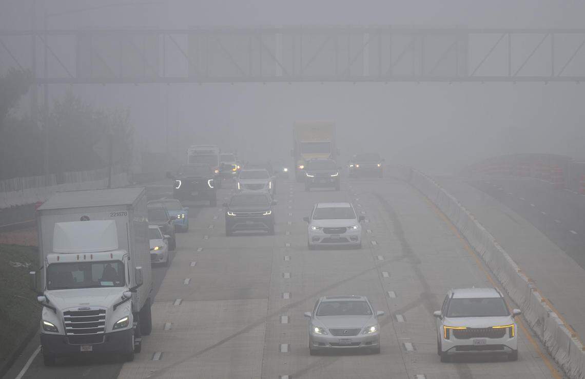 Vehicles with their headlights on drive west in the fog on Highway 50 in Sacramento on Monday morning, Dec. 29, 2025.