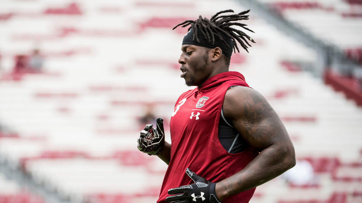 South Carolina defensive lineman Javon Kinlaw warms up before a game in November. The 49ers could use the big man to plug a hole in the defensive line.