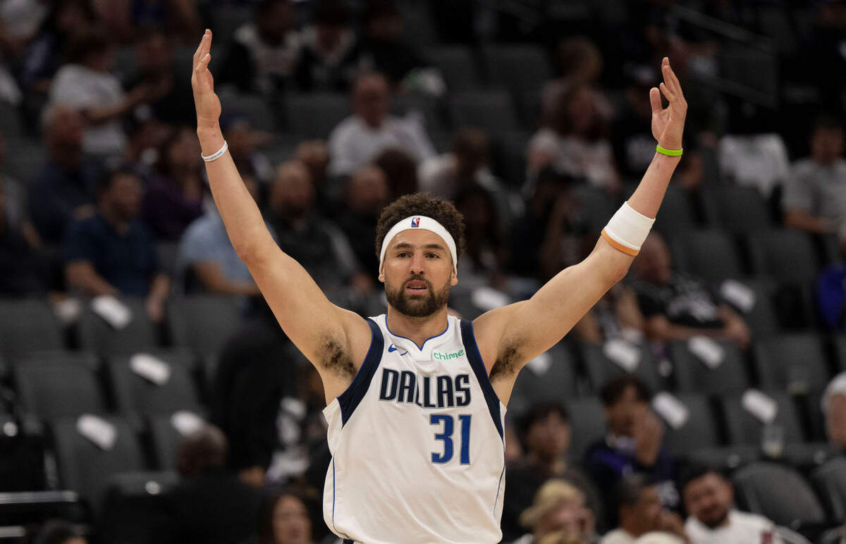 Dallas Mavericks guard Klay Thompson (31) celebrates a 3-point basket against the Sacramento Kings during an NBA play-in game at Golden 1 Center on Wednesday. The Kings lost 120-106 with Thompson contributing 23 points off the bench.