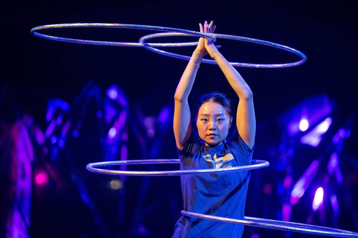 Hula hoop artist Yan Joan Zhuang rehearses for the Cirque du Soleil production of Alegría at the Sutter Health Park in West Sacramento on Wednesday, July 27, 2022.
