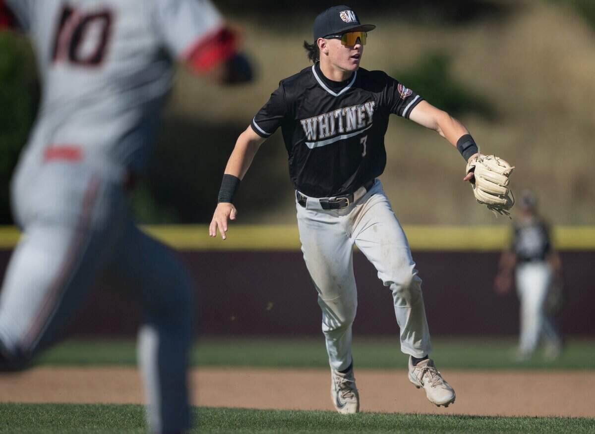 Whitney’s Jax Gimenez flips a ground ball hit by Cordova’s Gabriel Bargas for an out in the top-seeded Wildcats’ over Cordova on Tuesday.