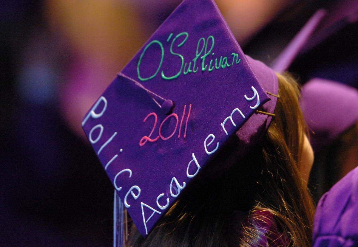 Tara O’Sullivan decorated her mortar board with her police academy plans at College Park High School’s commencement ceremony in 2011. O’Sullivan, an officer with the Sacramento Police Department, was killed on duty in Sacramento late Wednesday.