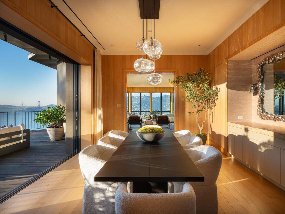 Bright and airy living spaces include a formal dining room and kitchen built for serious use.