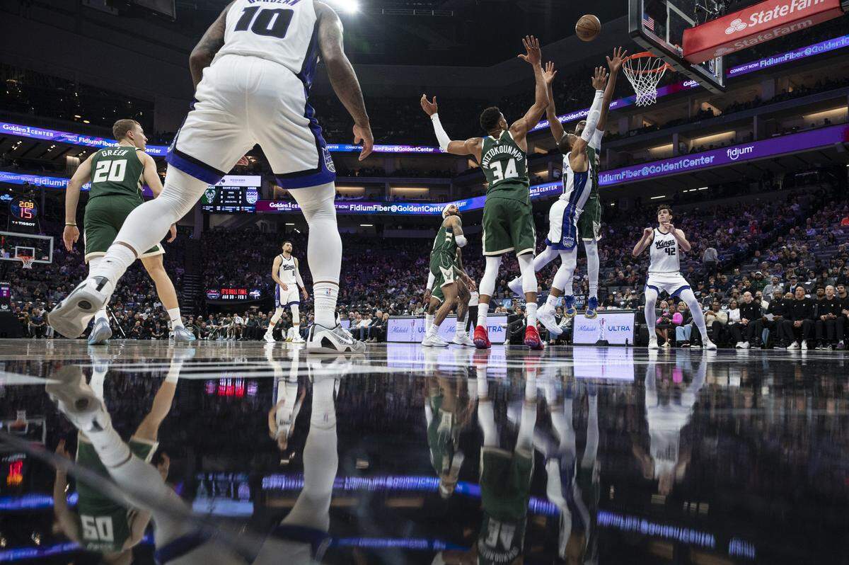 Sacramento Kings guard Russell Westbrook (18) shoots during a game at Golden 1 Center in Sacramento on Sunday, Jan. 4, 2026.