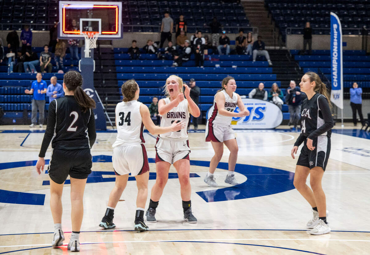 Bear River girls react as the buzzer goes off beating Valley Christian Academy during the CIF Sac-Joaquin Section Division V girls basketball section championship game on Friday at UC Davis.