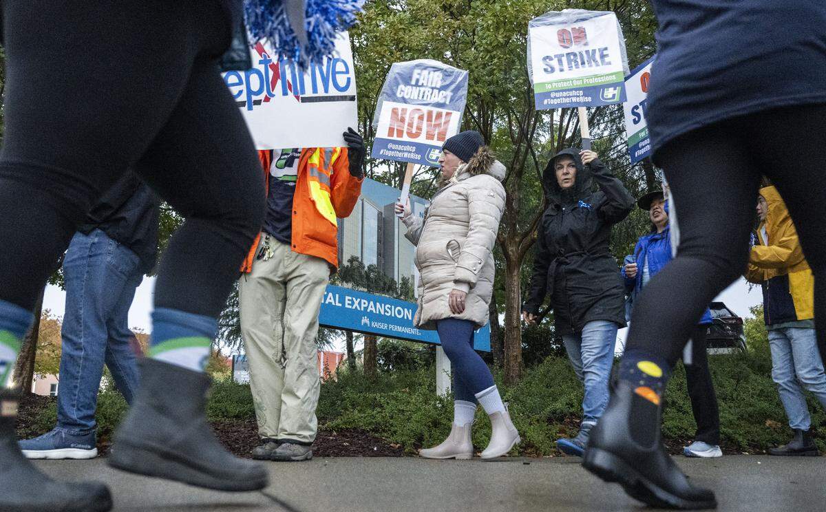 Workers and supporters take part in a strike at the Kaiser Permanente hospital in Roseville in October.