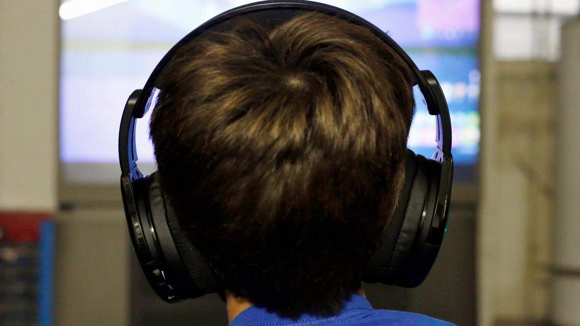 Henry Hailey, 10, plays one of the online Fortnite game in the early morning hours in the basement of his Chicago home in October. An unlicensed Fortnite Live festival in England inspired by the wildly popluar game has drawn a backlash from angry parents and a lawsuit from the game’s publisher.