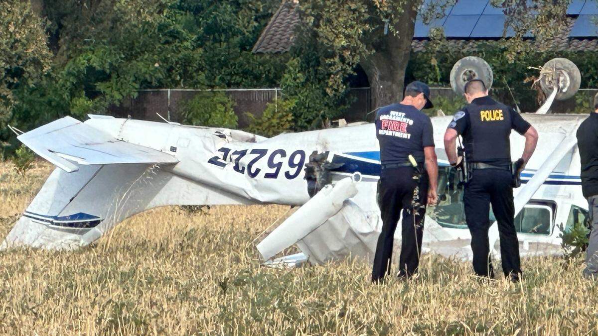 Authorities respond to a small plane crash in a field Thursday, Sept. 19, 2024, near West Sacramento. The Sacramento County Sheriff’s Office said its plane had made an emergency landing en route to Watts-Woodland Airport from Mather Airport.