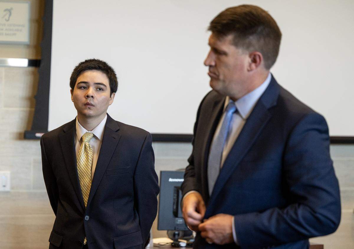 Carlos Dominguez stands with his attorney Daniel Hutchinson as the jury enters the courtroom in Superior Court in Woodland on Thursday, May 28, 2026, to hear opening arguments in Dominguez's trial for a 2023 incident in which Dominguez allegedly killed two people and injured one in Davis.