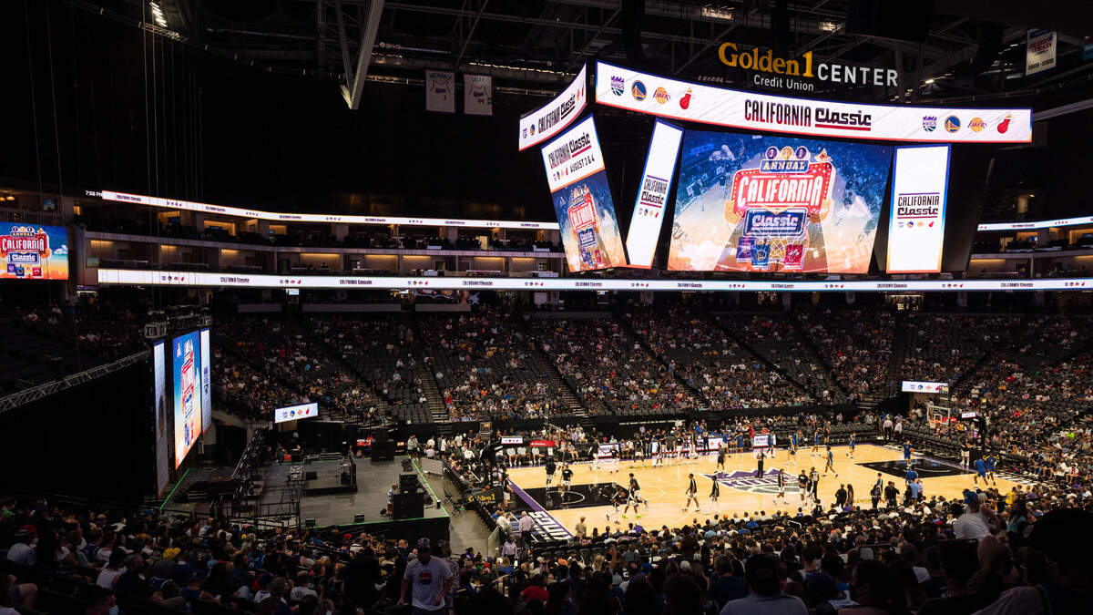 The Sacramento Kings and Golden State Warriors warm up before their NBA California Classic game Tuesday, Aug. 3, 2021, at Golden 1 Center in downtown Sacramento. The four-team, two-day format began Tuesday, featuring a double-header matchup each day with the Kings, Golden State Warriors, Los Angeles Lakers and Miami Heat.