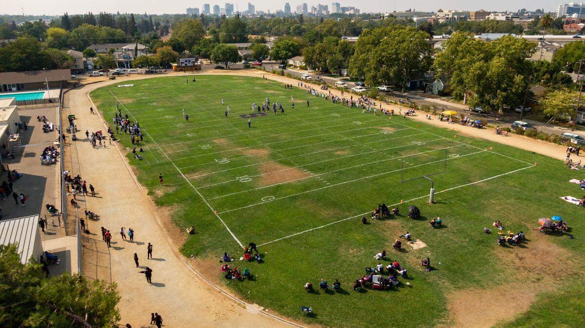 A drone shows the Sacramento Charter High School football field during a game Aug. 21 between the Dragons and Stockton’s Stagg High School. Sacramento High lacks in its field facilities when compared to many other area schools.