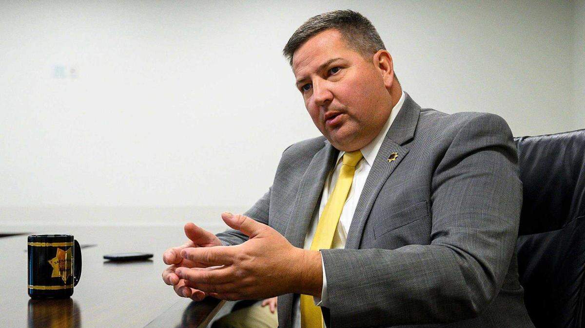 Sheriff Scott Jones, speaking from his office last year, has tested positive for the virus that causes COVID-19, the Sacramento County Sheriff’s Office said Wednesday.