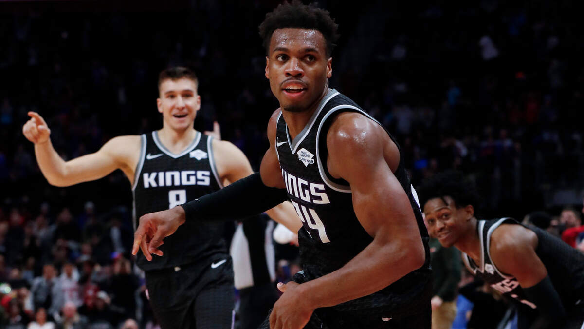 Kings guard Buddy Hield celebrates hitting the game-winning 3-pointer against the Detroit Pistons on Saturday.