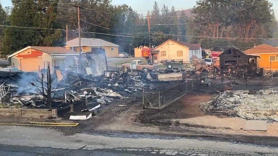 Homes are seen burned in the Lincoln Heights neigborhood of Weed, Calif., on Saturday, Sept. 3, 2022, after the Mill Fire tore through the historically Black neighborhood the day before.