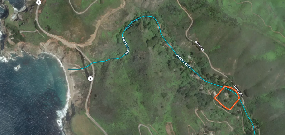 The 2.61-acre property offers private-road access to the Pacific Ocean shoreline.