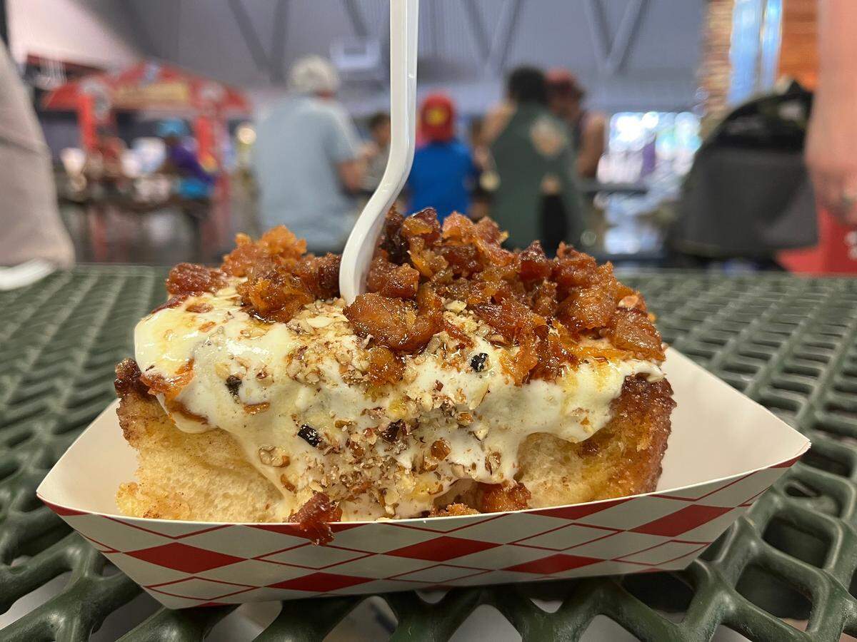 The maple bacon cinnamon bomb, from County Fair Cinnamon Rolls, as served at the California State Fair on Friday, July 15 2022
