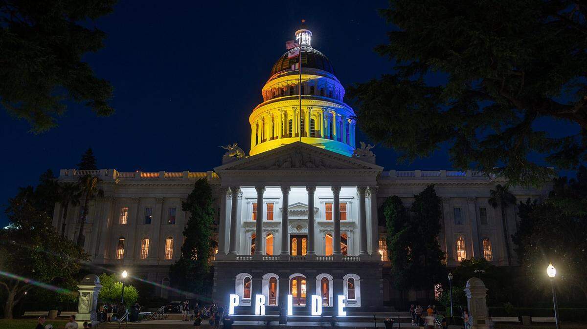 The state Capitol in Sacramento was illuminated in rainbow colors to celebrate LGBT Pride Month on Monday night, June 21, 2021, as large illuminated letters spelled out “pride” on the building’s west steps.