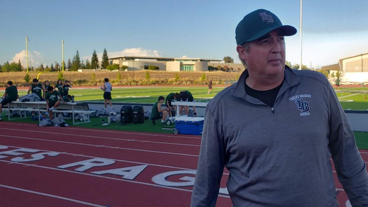 Twelve Bridges coach Chris Bean leads the Raging Rhinos into their first varsity season.