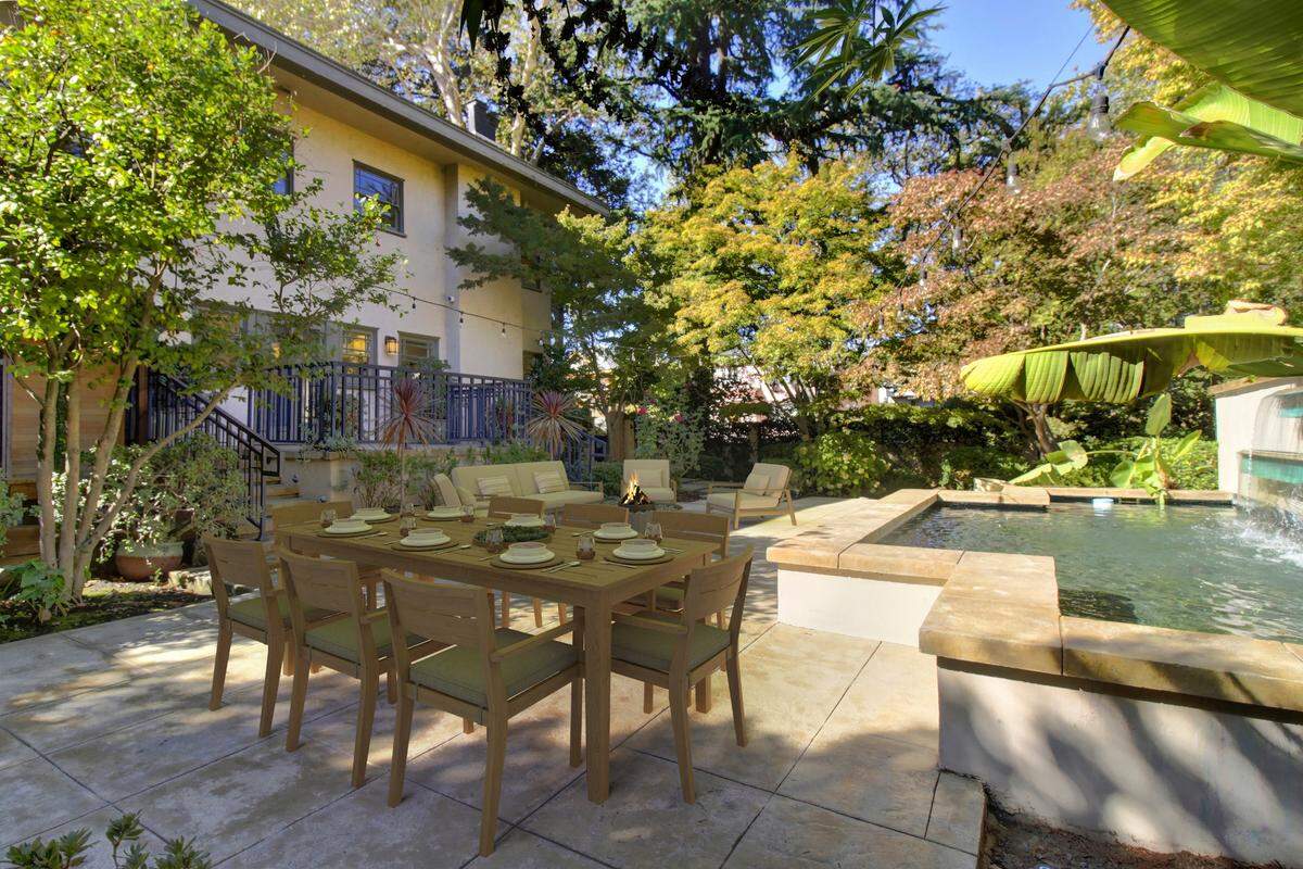 The backyard is spacious with a plunge pool.