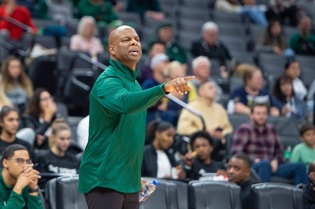 Sacramento State Hornets coach David Patrick calls a play to the team during the first half in the Causeway Classic on Tuesday, Nov. 22, 2022, at Golden 1 Center in Sacramento. The Aggies won 82-71.