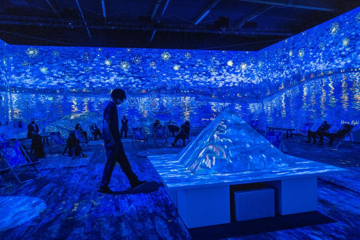 Workers get training inside the the Van Gogh Immersive Experience in West Sacramento on Tuesday, June 28, 2022. “This is our crown jewel. This is our 10,000 square foot immersive gallery featuring 4K projection mapping,” said Zaller, the executive producer of the exhibition hub.