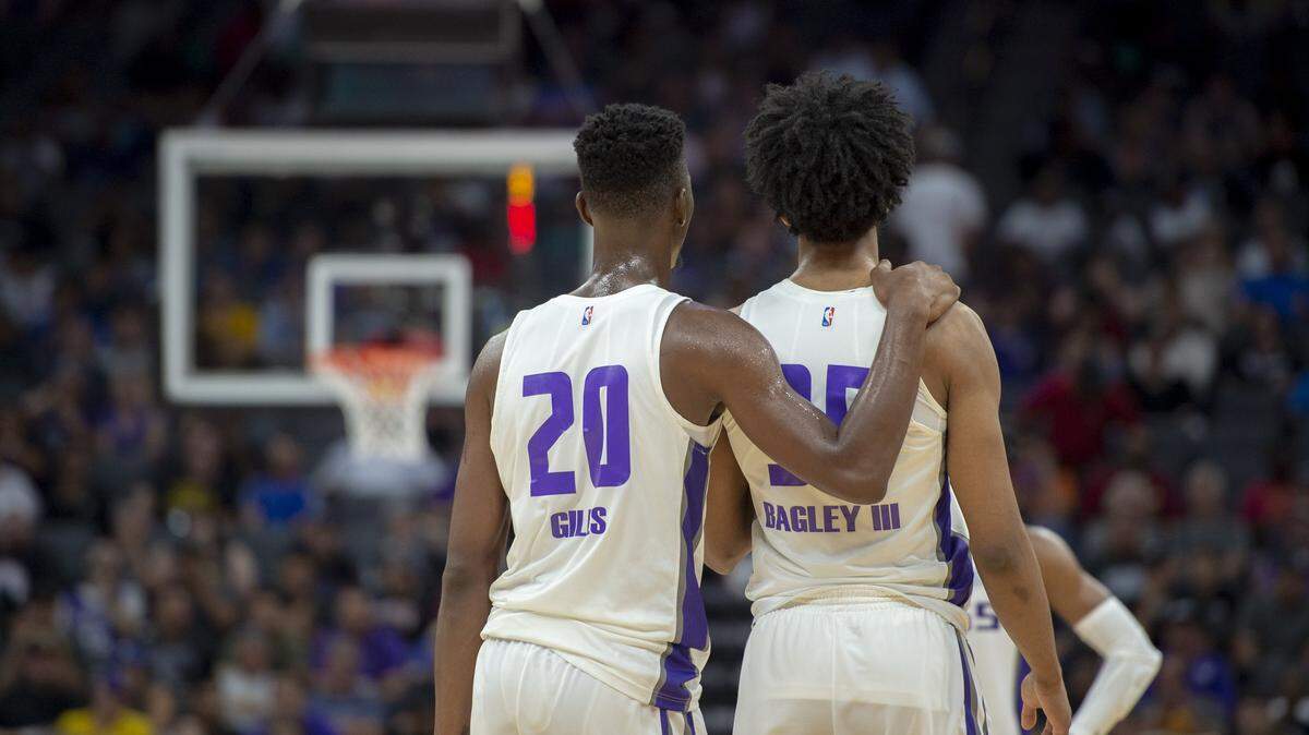 Kings forwards Harry Giles III, left, and Marvin Bagley III have received some praise from some national media outlets. Their fellow rookies, not so much.