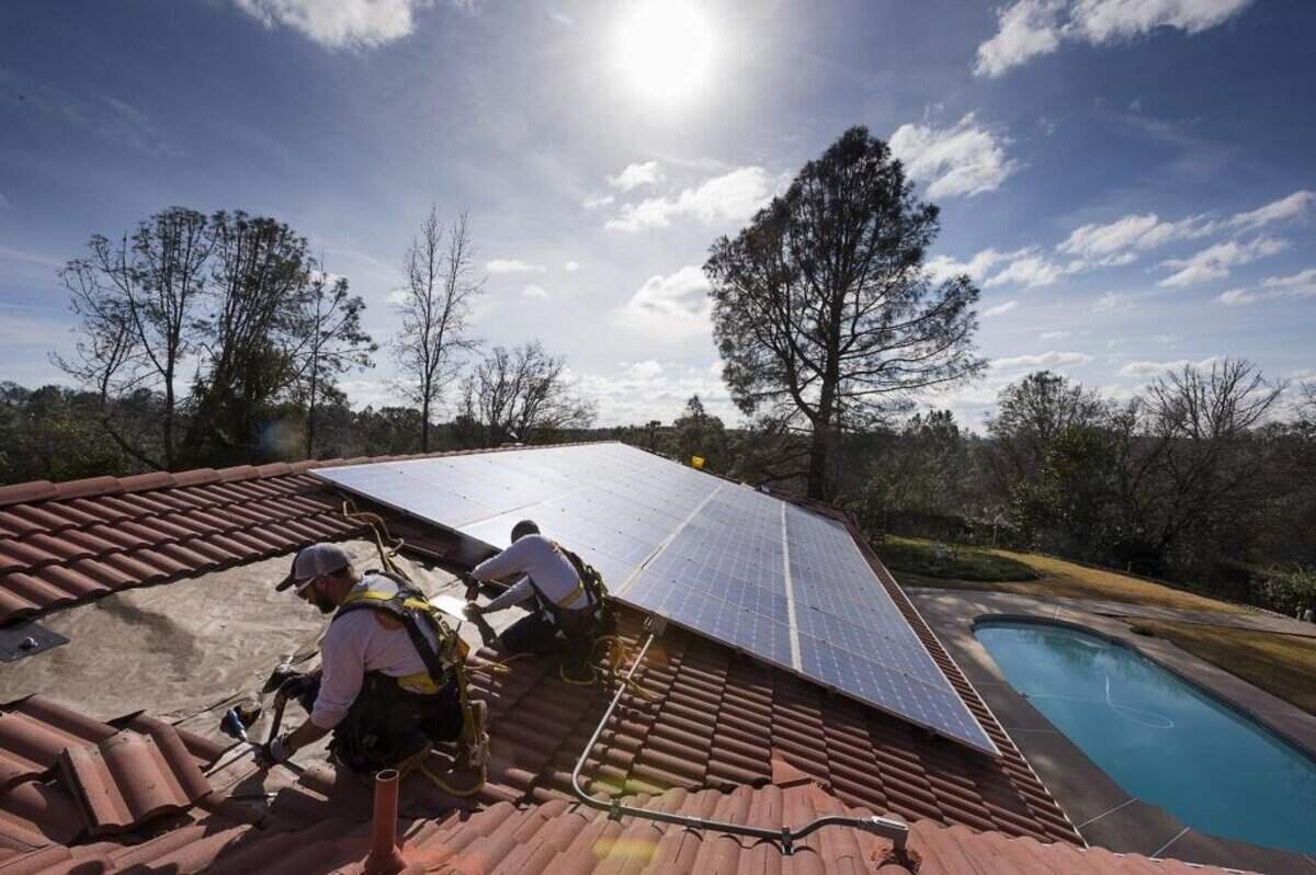 Brackets for rooftop solar are installed on a roof in Loomis. Beginning in 2020, new California homes will be built with solar panels.