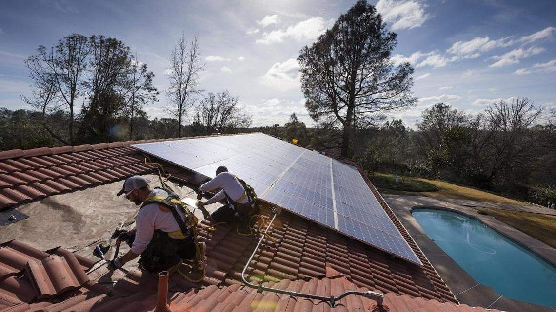 Brackets for rooftop solar are installed on a roof in Loomis. Beginning in 2020, new California homes will be built with solar panels.
