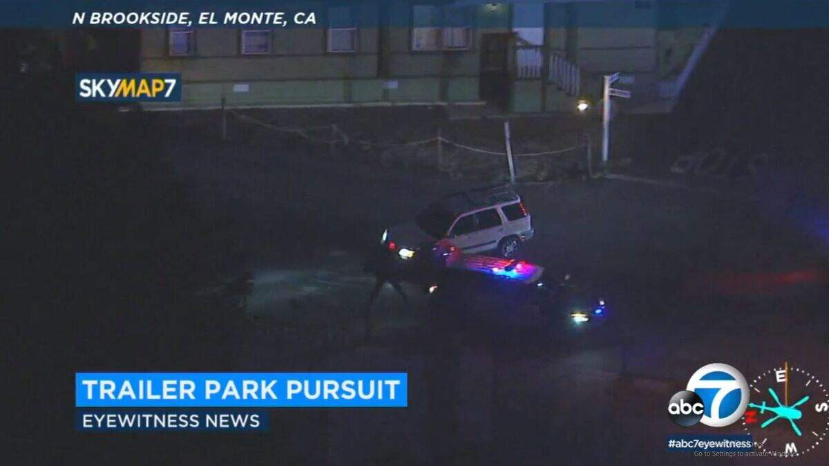 A possibly stolen SUV led El Monte, California, police on a chase around and around a mobile home park that had been blocked off by officers Wednesday before a punctured tire finally fell off the vehicle, police say.