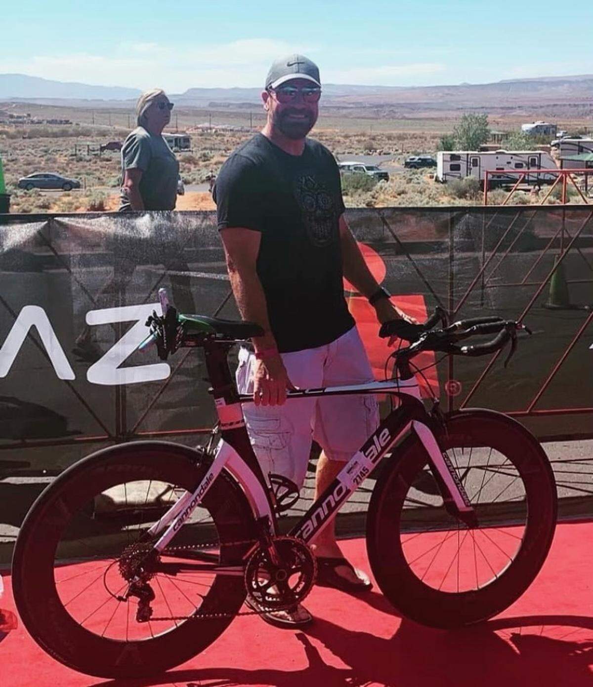 Vince Jones poses in front of his bike.