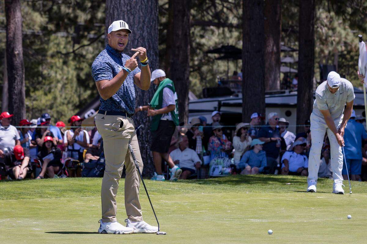 Kansas City Chiefs quarterback Patrick Mahomes II indicates to fans that he was using his ring finger on the seventeenth hole during the American Century Celebrity Golf Championship Tournament at Edgewood Tahoe Golf Course in Stateline, Nev., on Sunday, July 10, 2022. Mahomes finished tied for 51st with former NFL quarterback David Carr.