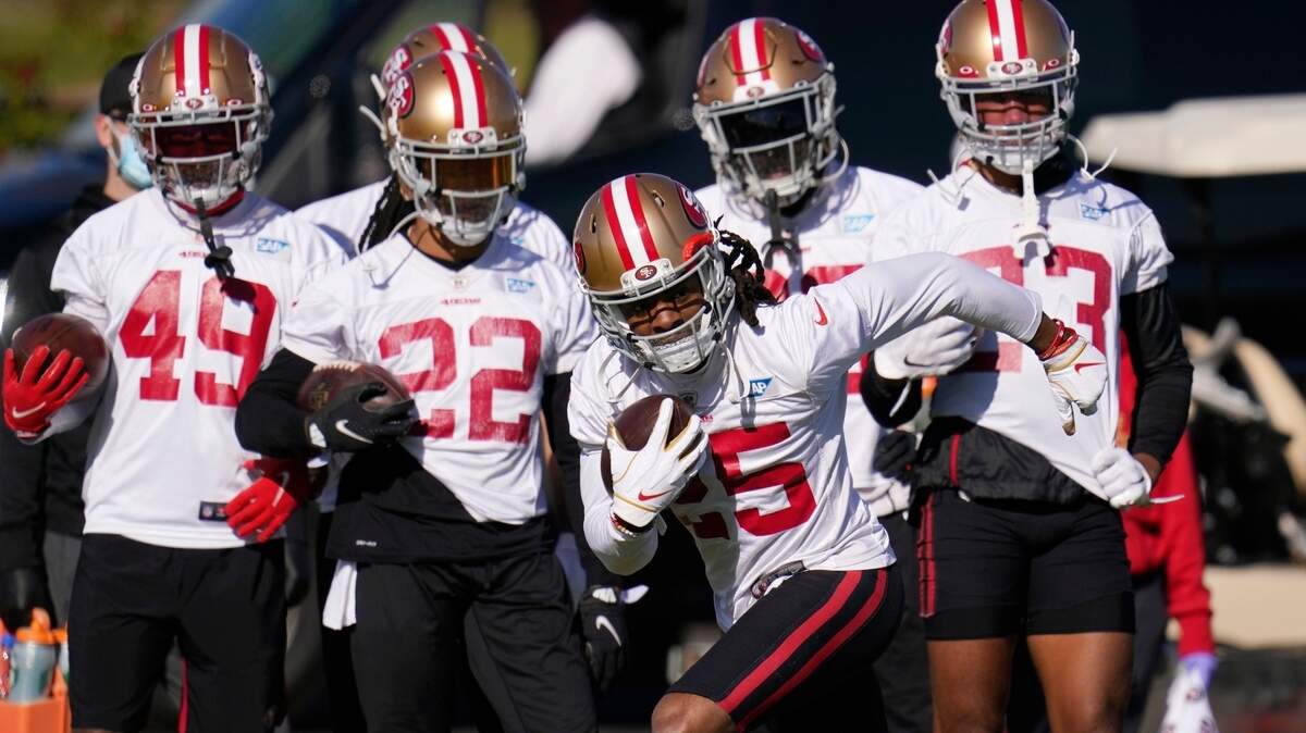 San Francisco cornerback Richard Sherman takes off with the ball during practice Thursday.