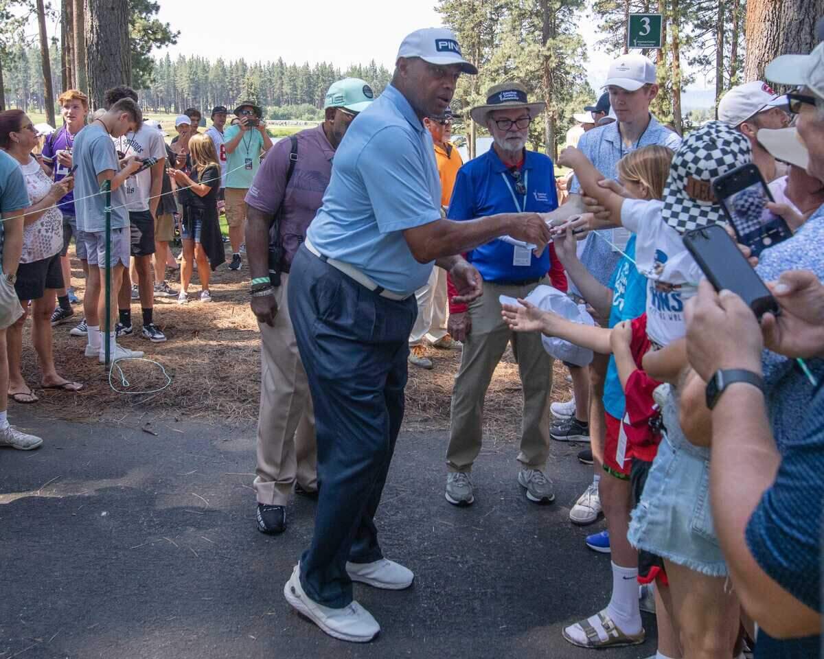 Charles Barkley signs autographs for the fans during the first round of the American Century Championship celebrity golf tournament at Edgewood Tahoe Golf Course in Stateline, Nev., on Friday.