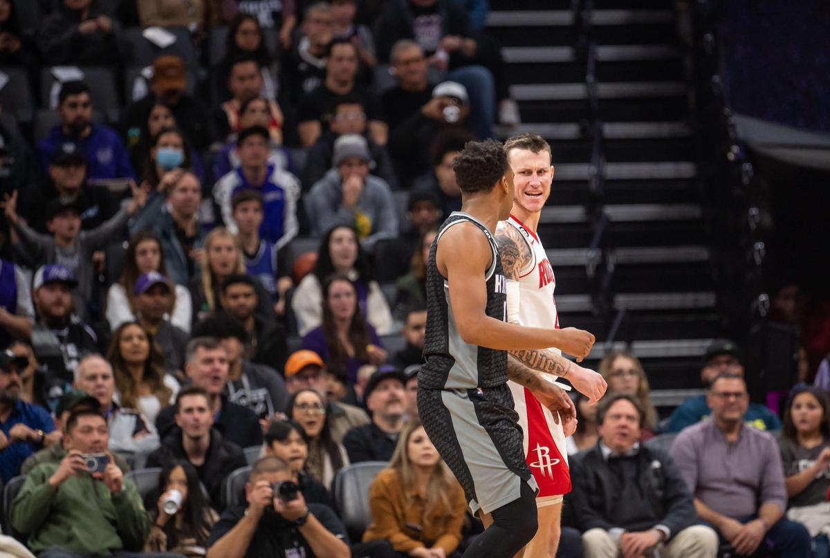 Sacramento Kings guard Malik Monk (0), left, has words with Houston Rockets guard Garrison Mathews (25) leading to a skirmish in the fourth quarter of the NBA basketball game Friday, Jan. 13, 2023, at Golden 1 Center in Sacramento. Two players from each team, including Mathews and Monk, were ejected.