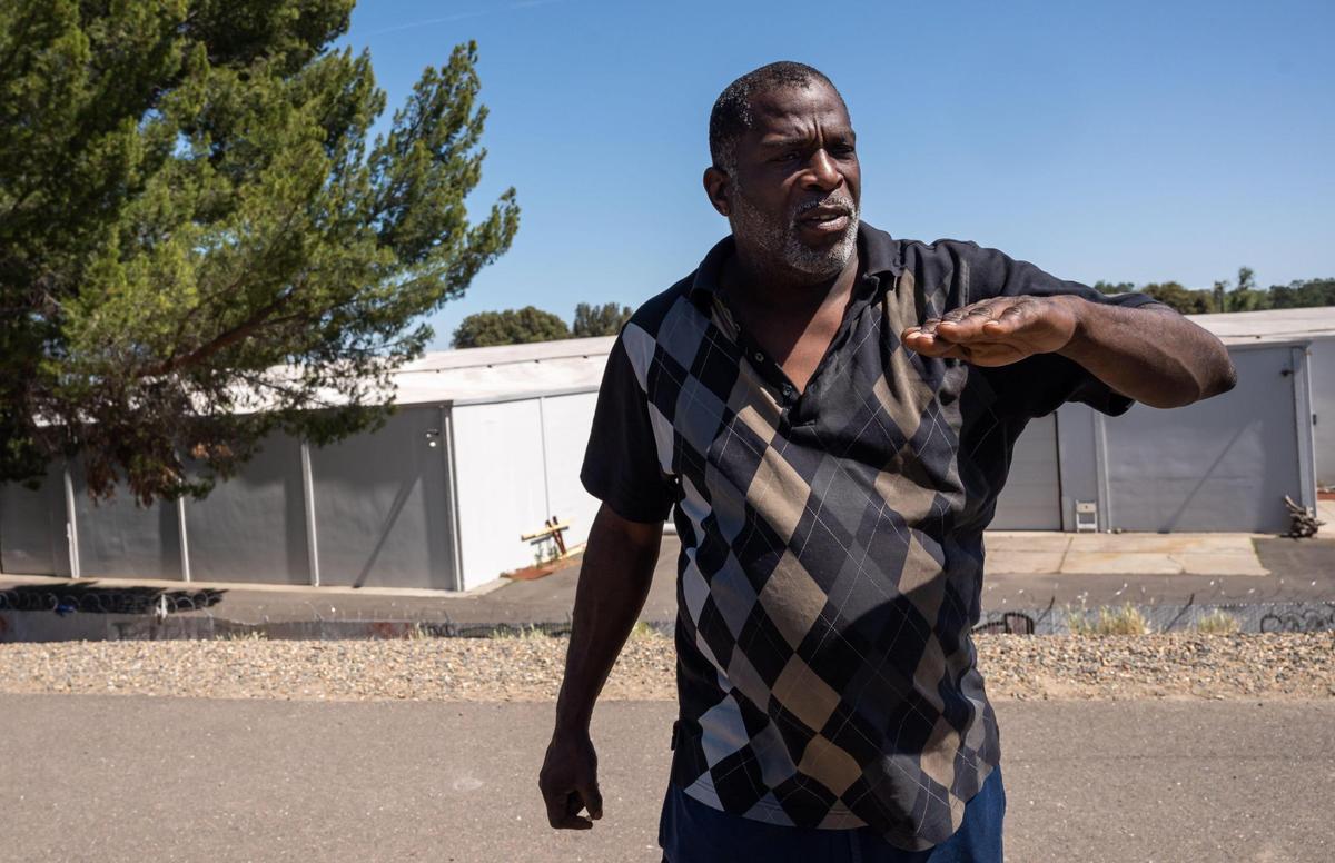 Dennis McGlothen, who lives in a tent across a bicycle path from businesses on Railroad Drive, recounts how property owner Rich Eaton threatened him and others to move, even when they were camping on private property.