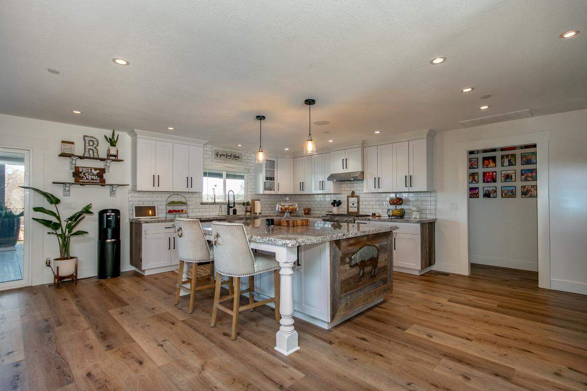 The gourmet kitchen has plenty of storage.