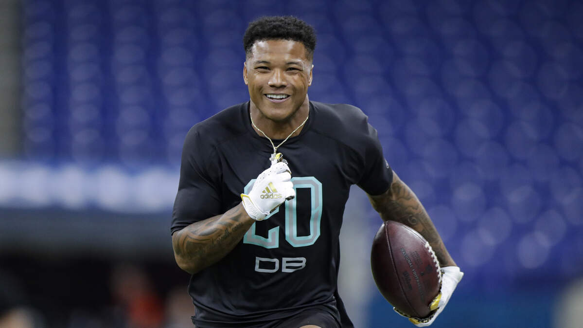 Nebraska defensive back Lamar Jackson smiles as he runs a drill at the NFL Combine in February.