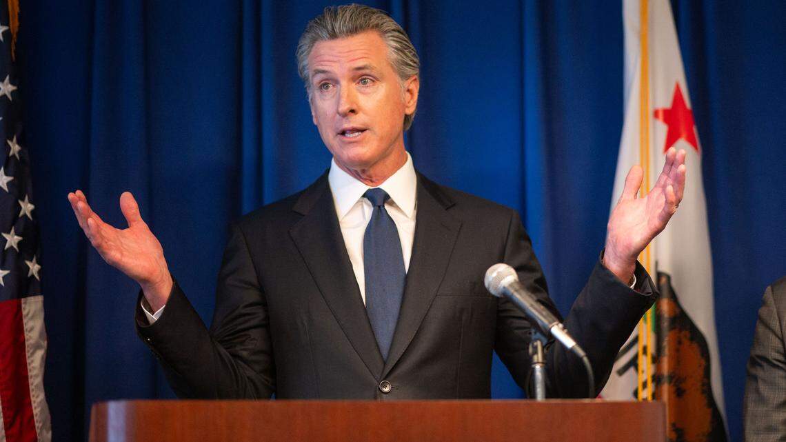 Gov. Gavin Newsom answers questions from the media Wednesday, Sept. 4, 2024, at a California Department of Justice press conference in Sacramento.