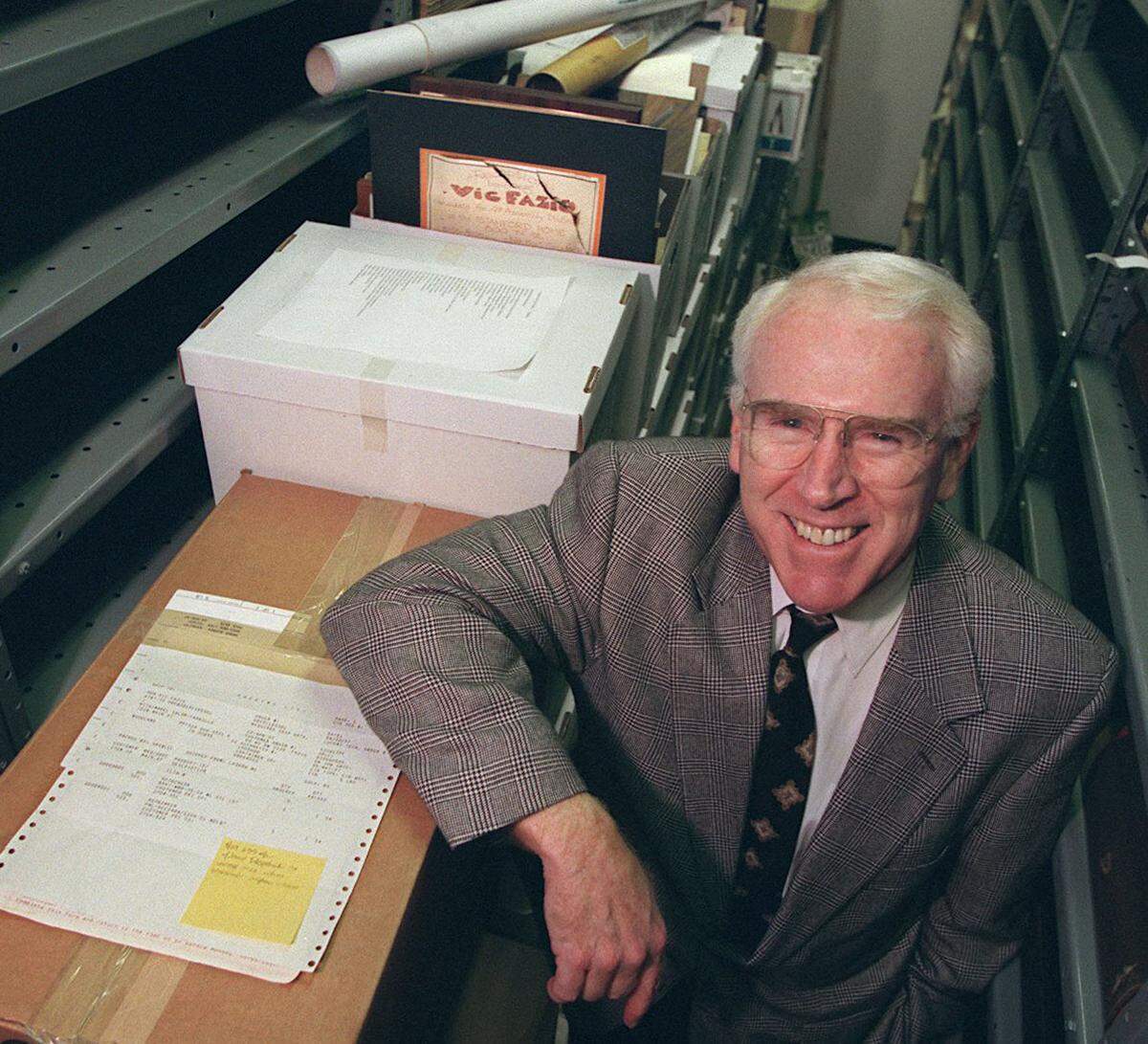 Former U.S. Congressman Vic Fazio stands with boxes of his legal papers which he donated to UC Davis in 1999. Fazio represented the 3rd Congressional District for more than 20 years, spanning four presidencies.
