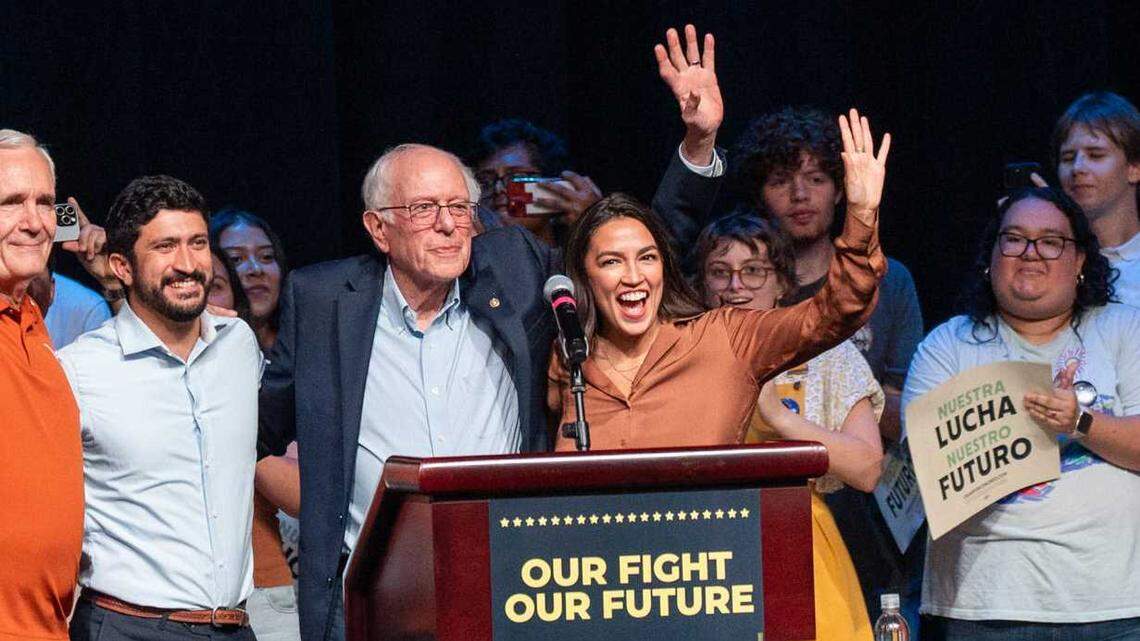 U.S Sen. Bernie Sanders and Congresswoman Alexandria Ocasio-Cortez, center, wave to the crowd during a rally at the University of Texas in Austin in October. The Democratic politicians will speak Tuesday at Folsom Lake College as part of their Fighting Oligarchy tour.