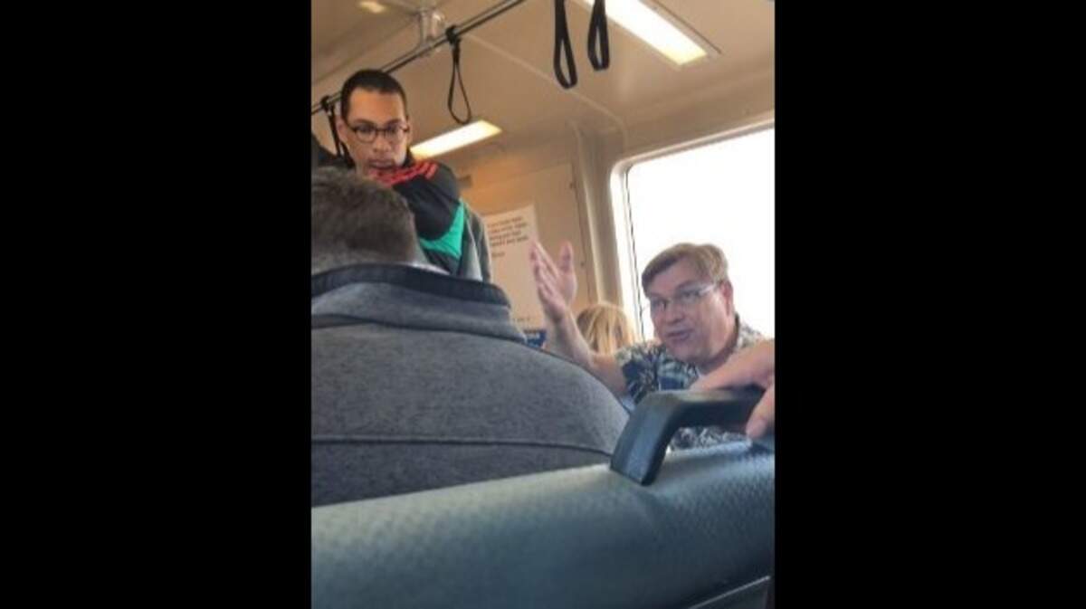 A video posted Sunday to Reddit shows a man in a Hawaiian shirt calling police on a fellow BART passenger eating a burrito on a commuter train. Signs on the Bay Area, California, rapid-transit trains forbid eating and drinking on board.
