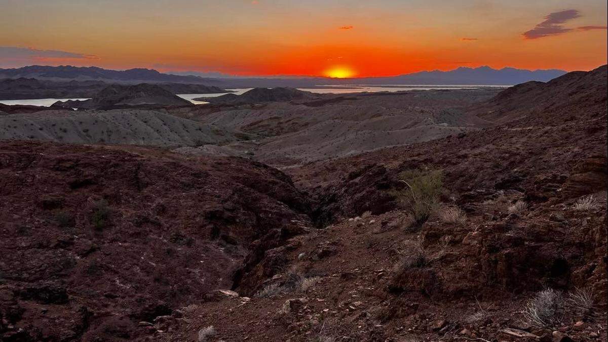 A 31-year-old man who became lost while trying to reach the trailhead after running out of water hiking in a Lake Havasu City park died, Arizona officials say. Three others were rescued.