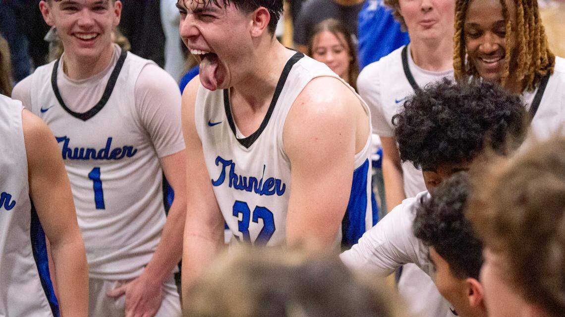 Rocklin Thunder center Mark Lavrenov (32) celebrates with his teammates after defeating the Sheldon Huskies 71-62 in a CIF Sac-Joaquin Section boys basketball Division I quarterfinal game on Friday in Rocklin.