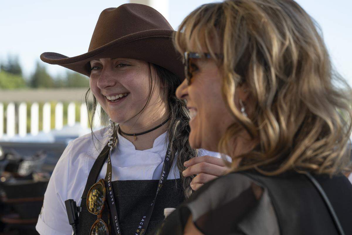 Jeana Marie Pecha, a member of the culinary team for the Tower Bridge Dinner, during the event on Sunday, Sept. 7, 2025.