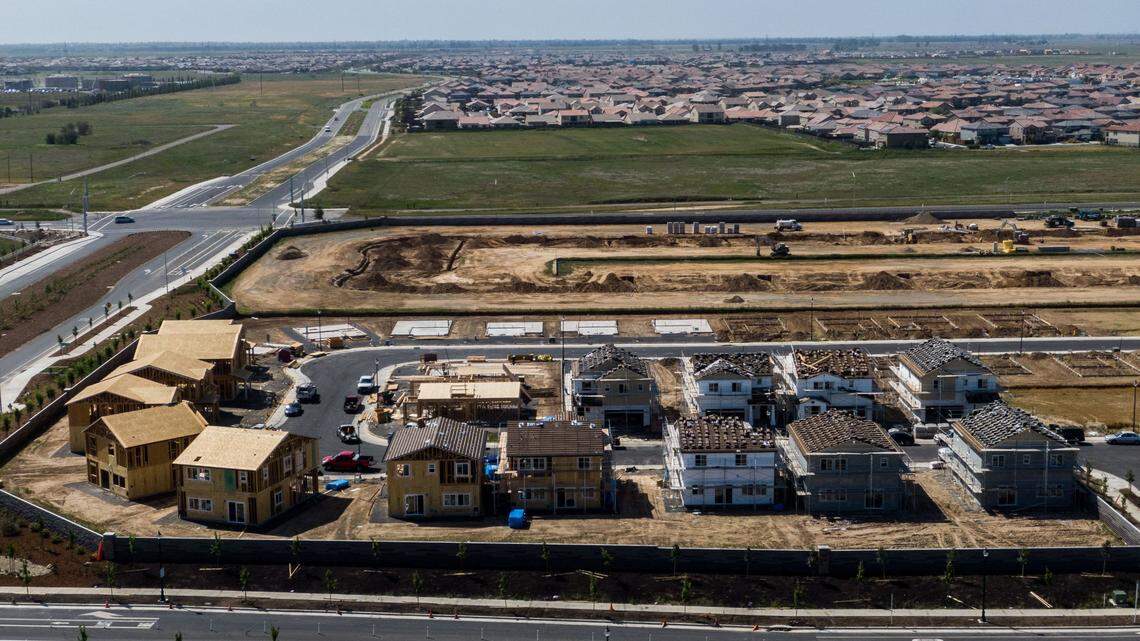 Workers build houses in the Winding Creek development in Roseville on Wednesday, April 14, 2021, continuing the city’s westward expansion. The inventory of homes for sale is on the rise in most of south Placer County.