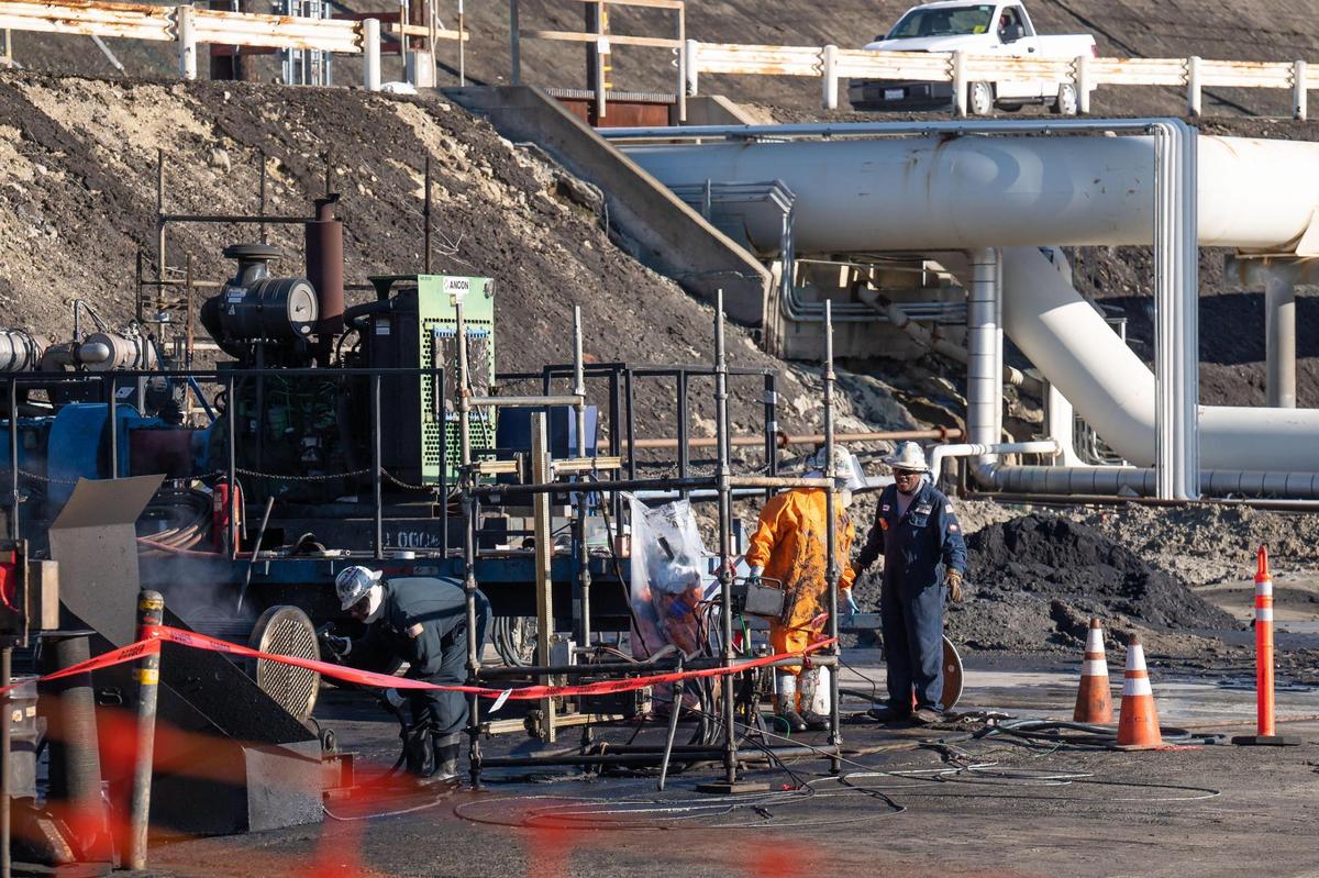 Employees at the Phillips 66 refinery in Rodeo — California’s oldest refinery — conduct cleaning and maintenance at the facility last month.