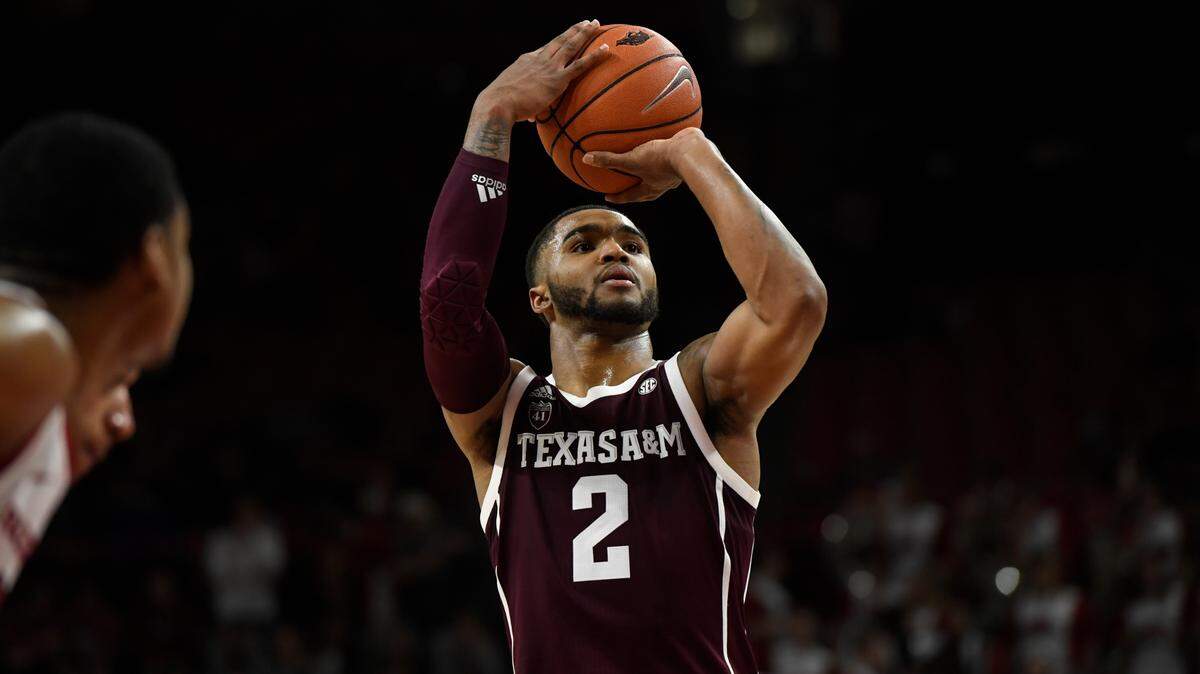 Texas A&M guard TJ Starks (2) shoots a free throw against Arkansas during the second half of an NCAA college basketball game, Saturday, Feb. 23, 2019 in Fayetteville, Ark. (AP Photo/Michael Woods)